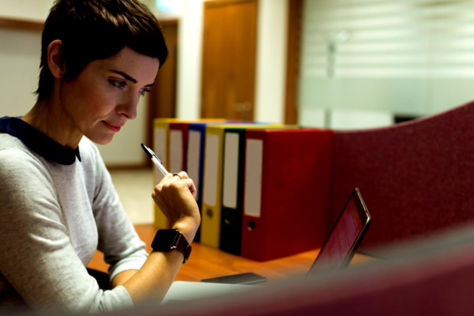 Financial planning workspace with documents and calculator